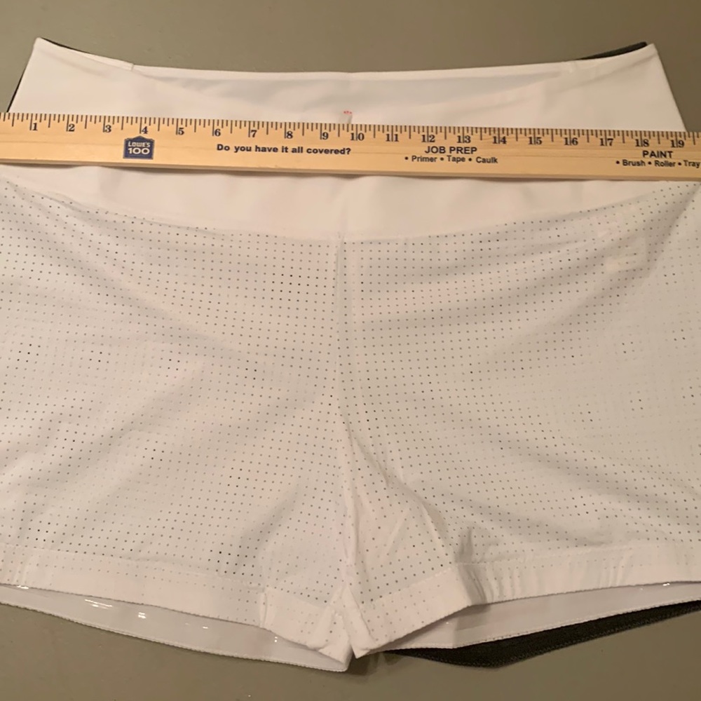 Kinona Mesh shorts with a pocket on right leg, 2 white,2 gray $15 each